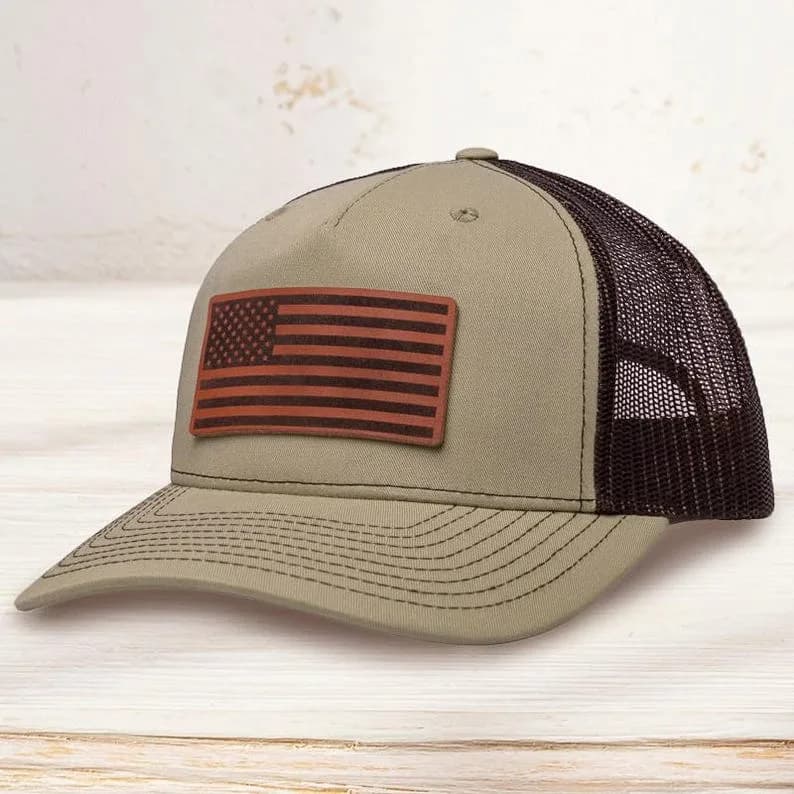 Custom leather patch trucker hat with engraved logo