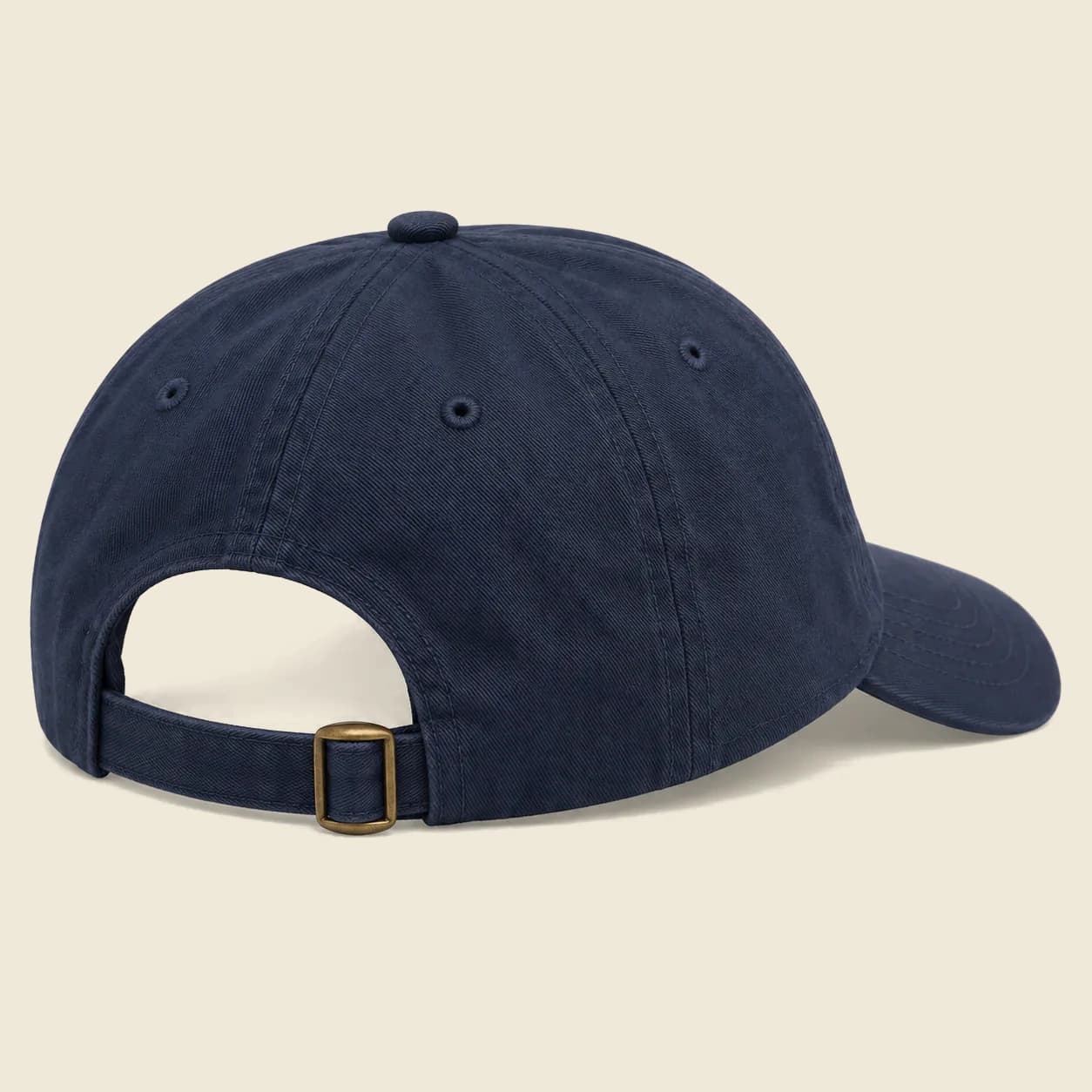 Custom Embroidered Dad Hats: Back of the navy dad hat: adjustable strap with a brass slide buckle