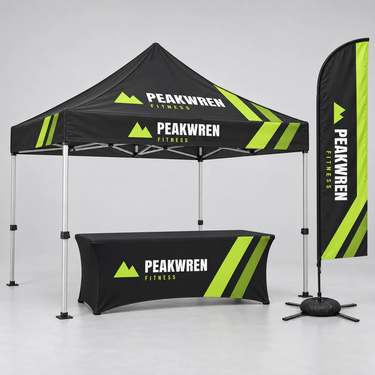 Booth Starter Kit, 10 x 10 Tent with Table Cover and Flag: Booth Starter Kit: a 10 x 10 ft canopy tent with no walls, a 6 ft stretch table cover and an 11 ft blade flag on an X base with water bag, printed with sample artwork for a fictional brand
