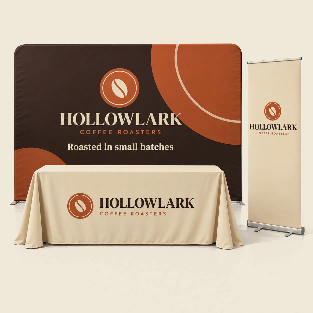 10 Ft Backdrop Display Package: Backdrop display package in a studio: 10 ft pillowcase backdrop, 8 ft table throw and roll up banner, printed with sample artwork for a fictional brand